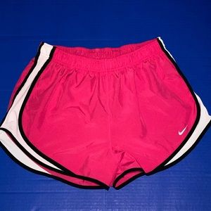 Pink nike running shorts.